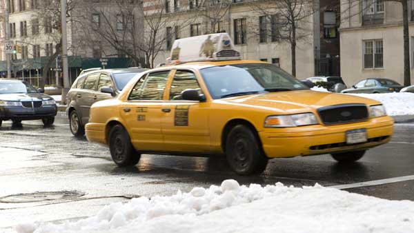 City street in winter showing why you need the best ice cleats for Fayette PA